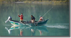 drift-boat-on-the-kenai-river-rainbow-trout-in-the-net